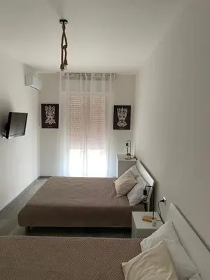 Letto o letti in una camera di Ù Curtigghiu
