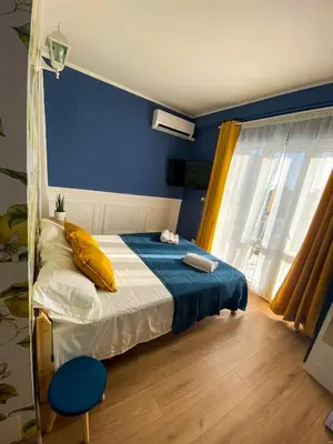 Letto o letti in una camera di Finestra sulla Sicilia