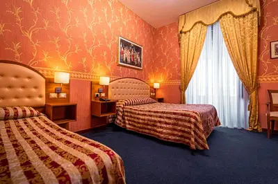 Letto o letti in una camera di Hotel Villa Romeo