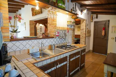 Cucina o angolo cottura di Villa Suq