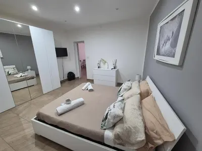 Letto o letti in una camera di Sweet Home Airport