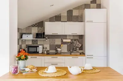 Cucina o angolo cottura di DOMUS COPPOLA CATANIA Apartments
