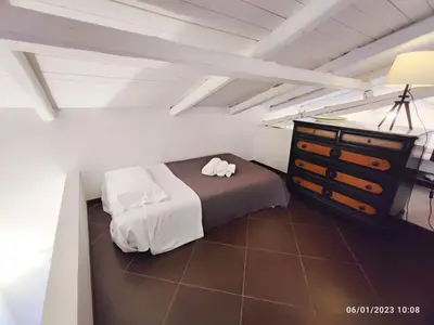 Letto o letti in una camera di DOMUS COPPOLA CATANIA Apartments