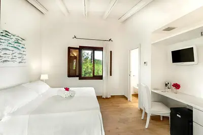 Letto o letti in una camera di Hotel Villa Mediterranea