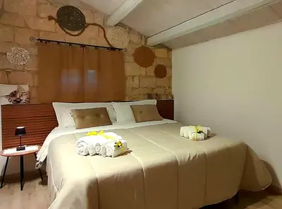 Letto o letti in una camera di Dimore del Monte 
