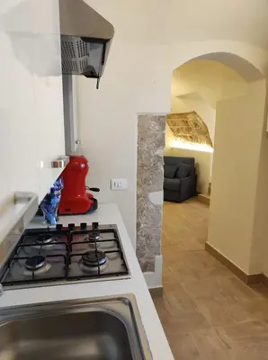 Cucina o angolo cottura di Amunì Holiday Home Noto