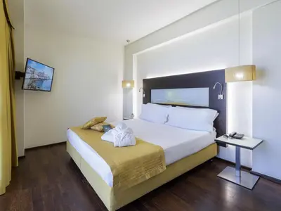 Letto o letti in una camera di Hotel Mercure Siracusa