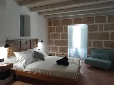 Letto o letti in una camera di Othila Home