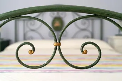 Letto o letti in una camera di Casa Sofocle comodo bivani in borgata a due passi da Ortigia senza i disagi i Ortigia
