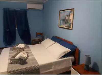 Letto o letti in una camera di Casa Narciso tra mare e canyon ad Avola