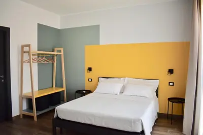 Letto o letti in una camera di Domus Solis