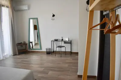 Letto o letti in una camera di Domus Solis