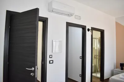 Letto o letti in una camera di Domus Solis