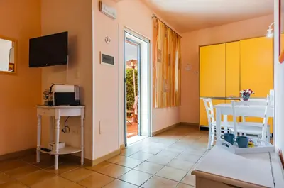TV o dispositivi per l'intrattenimento presso Stella del mare Apartments