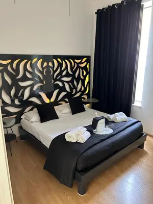 Letto o letti in una camera di Brimiky House