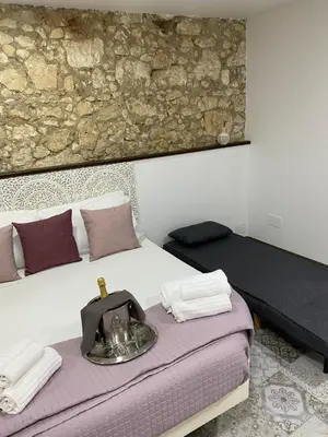 Letto o letti in una camera di Brimiky House
