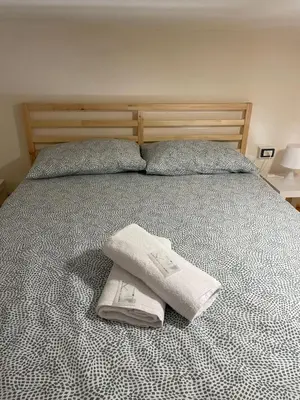 Letto o letti in una camera di Benedettini Home