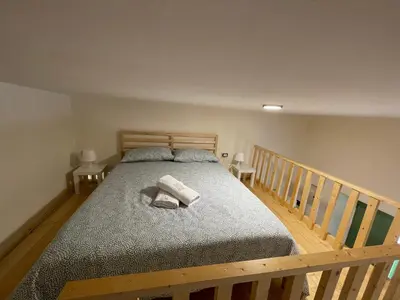 Letto o letti in una camera di Benedettini Home