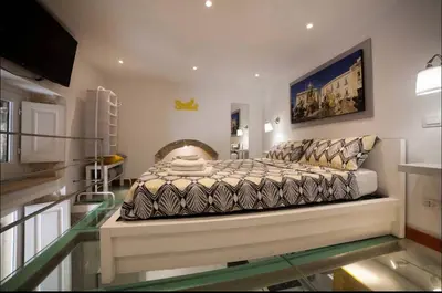Letto o letti in una camera di Loft Apollo / Ortigia Syracusae