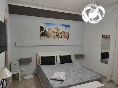 Letto o letti in una camera di Cataleya 2