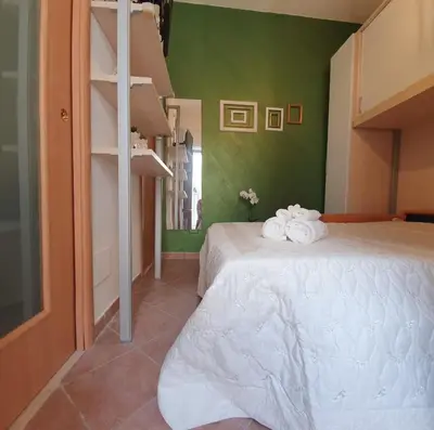 Letto o letti in una camera di One Love Ortigia