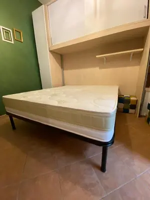 Letto o letti in una camera di One Love Ortigia