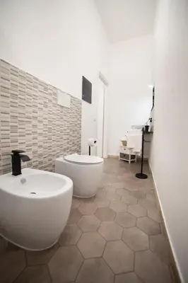 Bagno di Il rifugio in Borgata suite moderna vicino Ortigia e al mare