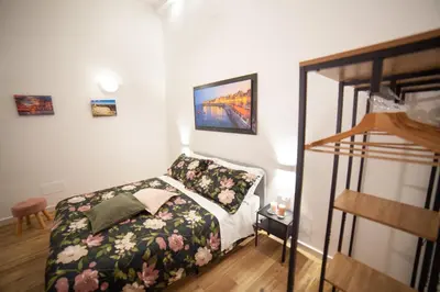 Letto o letti in una camera di Il rifugio in Borgata suite moderna vicino Ortigia e al mare