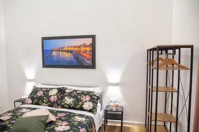 Letto o letti in una camera di Il rifugio in Borgata suite moderna vicino Ortigia e al mare
