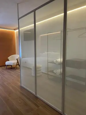 Letto o letti in una camera di Raha Suites