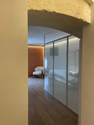 Letto o letti in una camera di Raha Suites