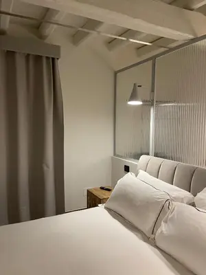 Letto o letti in una camera di Raha Suites