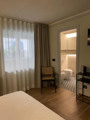 Letto o letti in una camera di Raha Suites