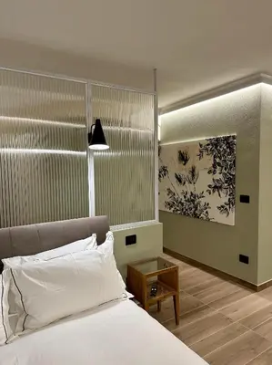 Letto o letti in una camera di Raha Suites