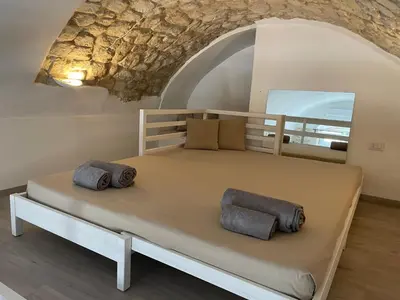 Letto o letti in una camera di Il Dammuso dei Sogni