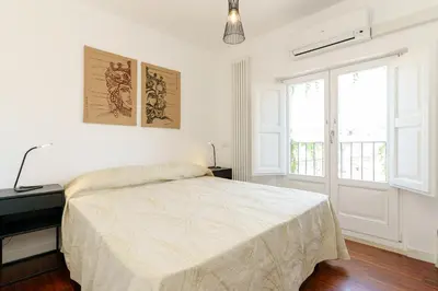 Letto o letti in una camera di Suite Verga