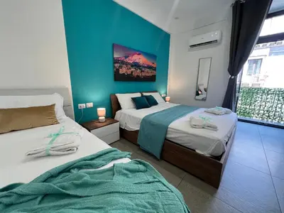 Letto o letti in una camera di TREASURE ROOMs