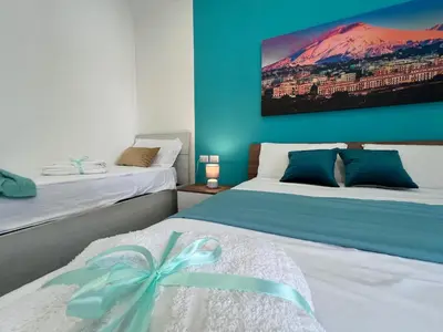 Letto o letti in una camera di TREASURE ROOMs