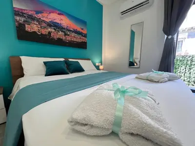 Letto o letti in una camera di TREASURE ROOMs