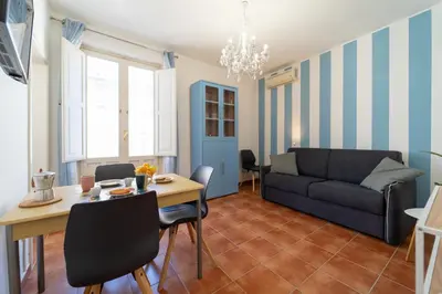 Area soggiorno di GuestHost - La Casa dei Mori - Ortigia Central Apartment