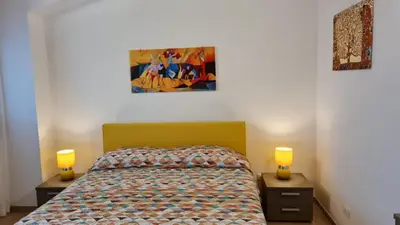 Letto o letti in una camera di Casa vacanze Le Agavi