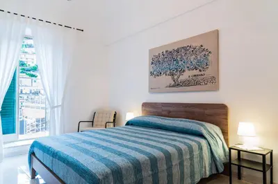 Letto o letti in una camera di Casa Nà Za Maria