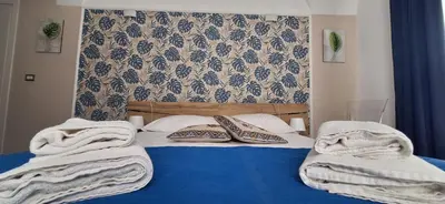 Letto o letti in una camera di Lilly house