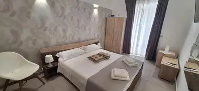 Letto o letti in una camera di Lilly house