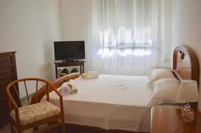Letto o letti in una camera di Nelly’s House