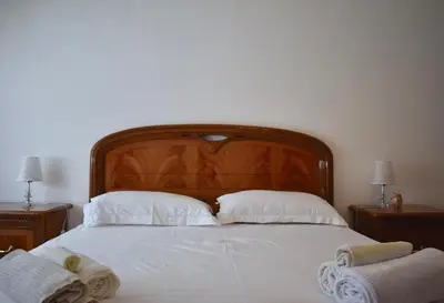 Letto o letti in una camera di Nelly’s House