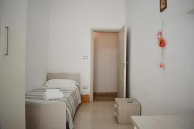 Letto o letti in una camera di Nelly’s House