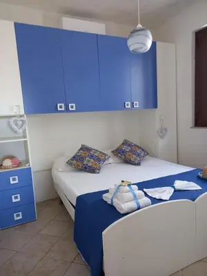 Letto o letti in una camera di Villa Serenità