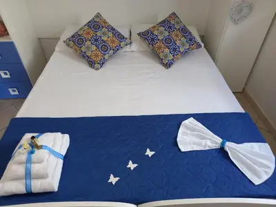 Letto o letti in una camera di Villa Serenità