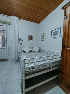 Letto o letti in una camera di Casa Minniti